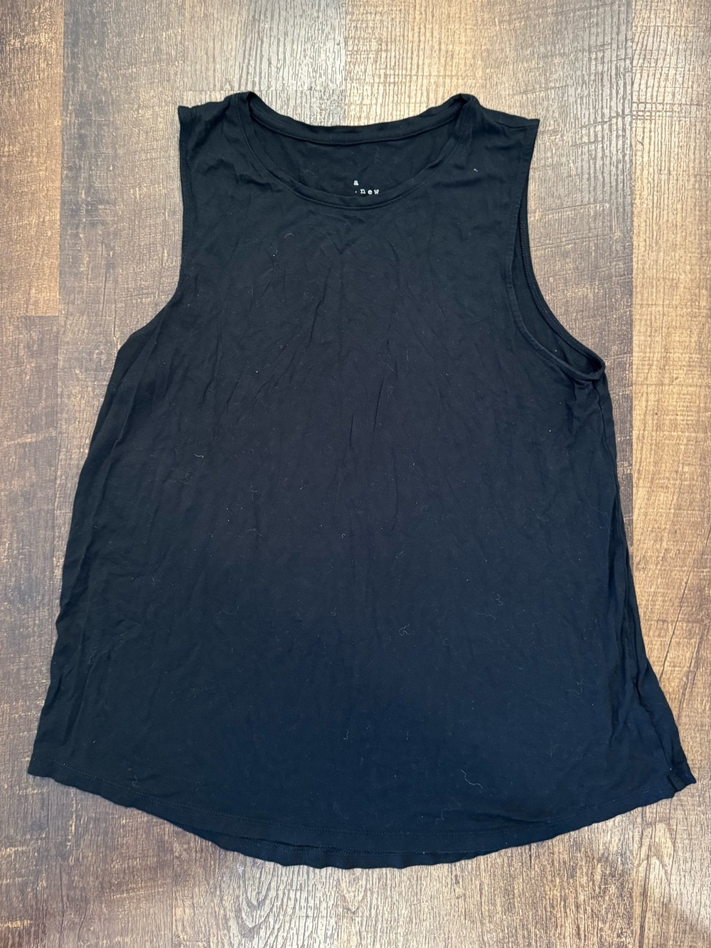 A new day black muscle tank top